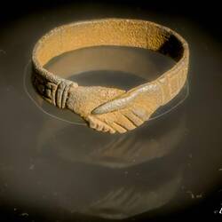 Ring depicting two holding hands; Middle Ages — Bryggens Museum, Bergen.