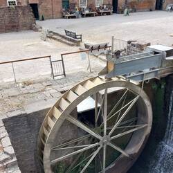 Cromford Mill: The water wheel has been refurbished and provides energy for the site now