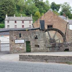 Cromford; A mid-19th century water wheel for a mill grinding locally mined barytes