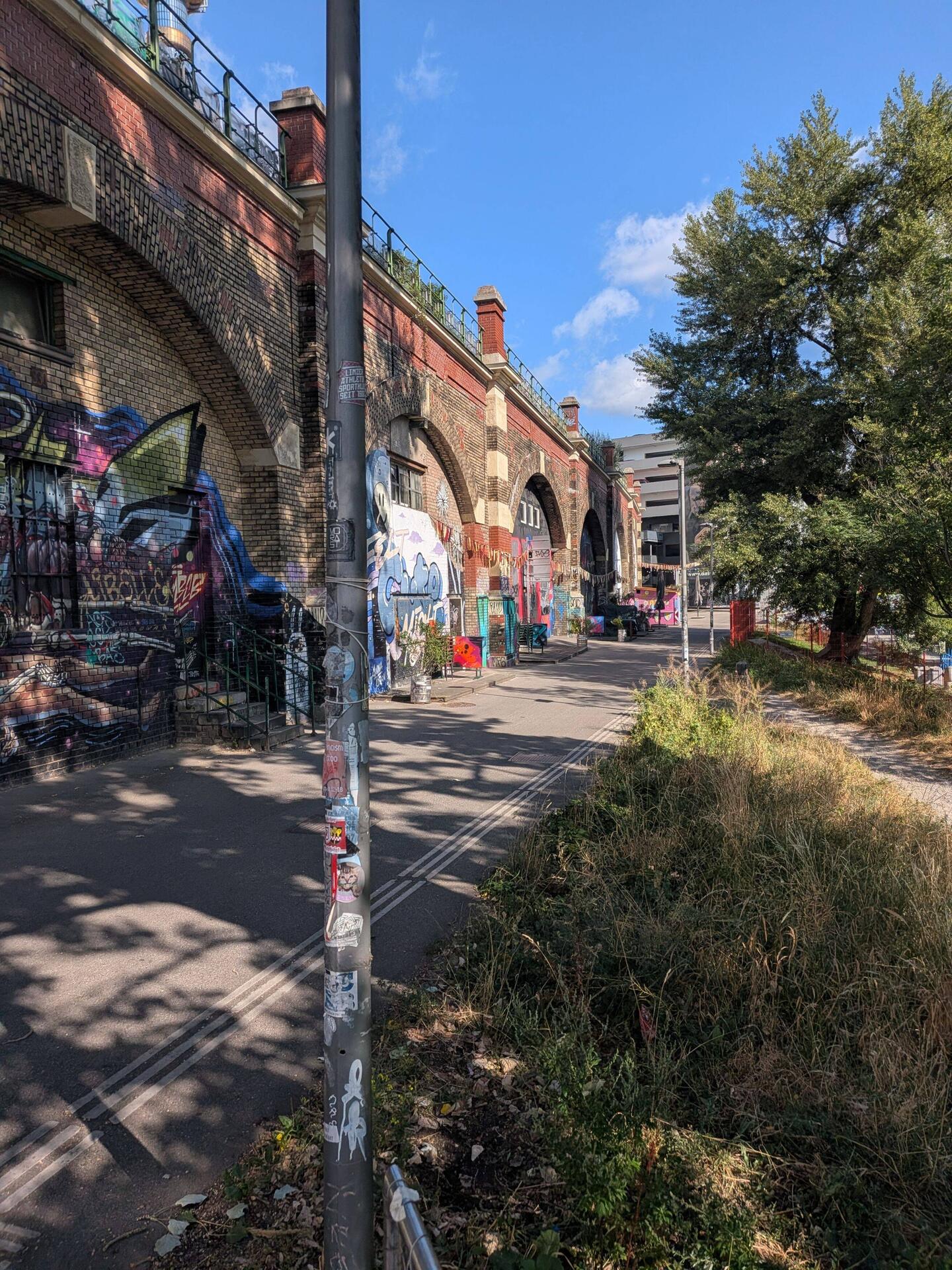 Bike path along the Danube Canal. This district is where graffiti is allowed