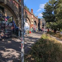 Bike path along the Danube Canal. This district is where graffiti is allowed