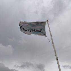 The wind is blowing the flag apart