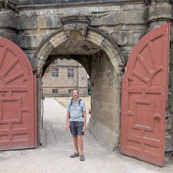 The red doors leading into the Little Castle after crossing the yard