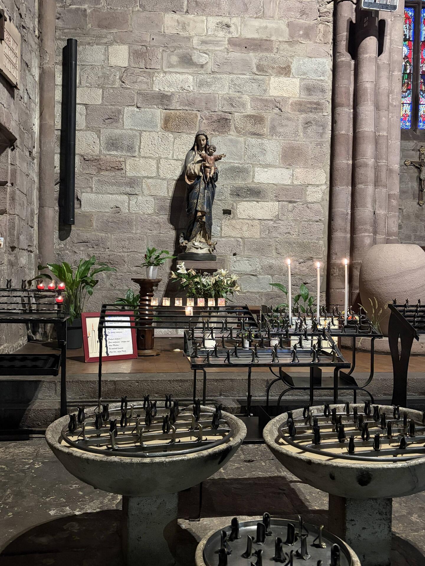 Beautiful old church at SJPP. Candles lit for each son.