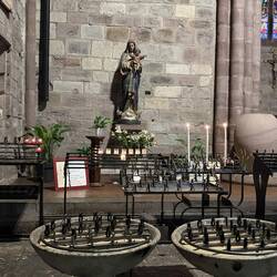 Beautiful old church at SJPP. Candles lit for each son.