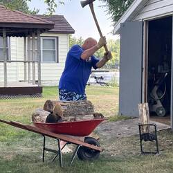 Me hard at work splitting logs.
