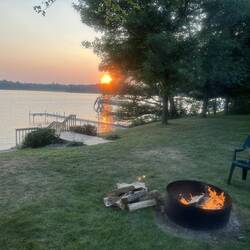 Sunset behind the campfire.