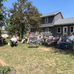 Just enjoying conversation and the lake view.