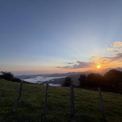 Sunrise was magnificent. That is not water to the left. Those are the clouds we are above.
