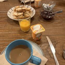 Breakfast was coffee or tea, yogurt, cereal, bread, butter, jam, orange juice