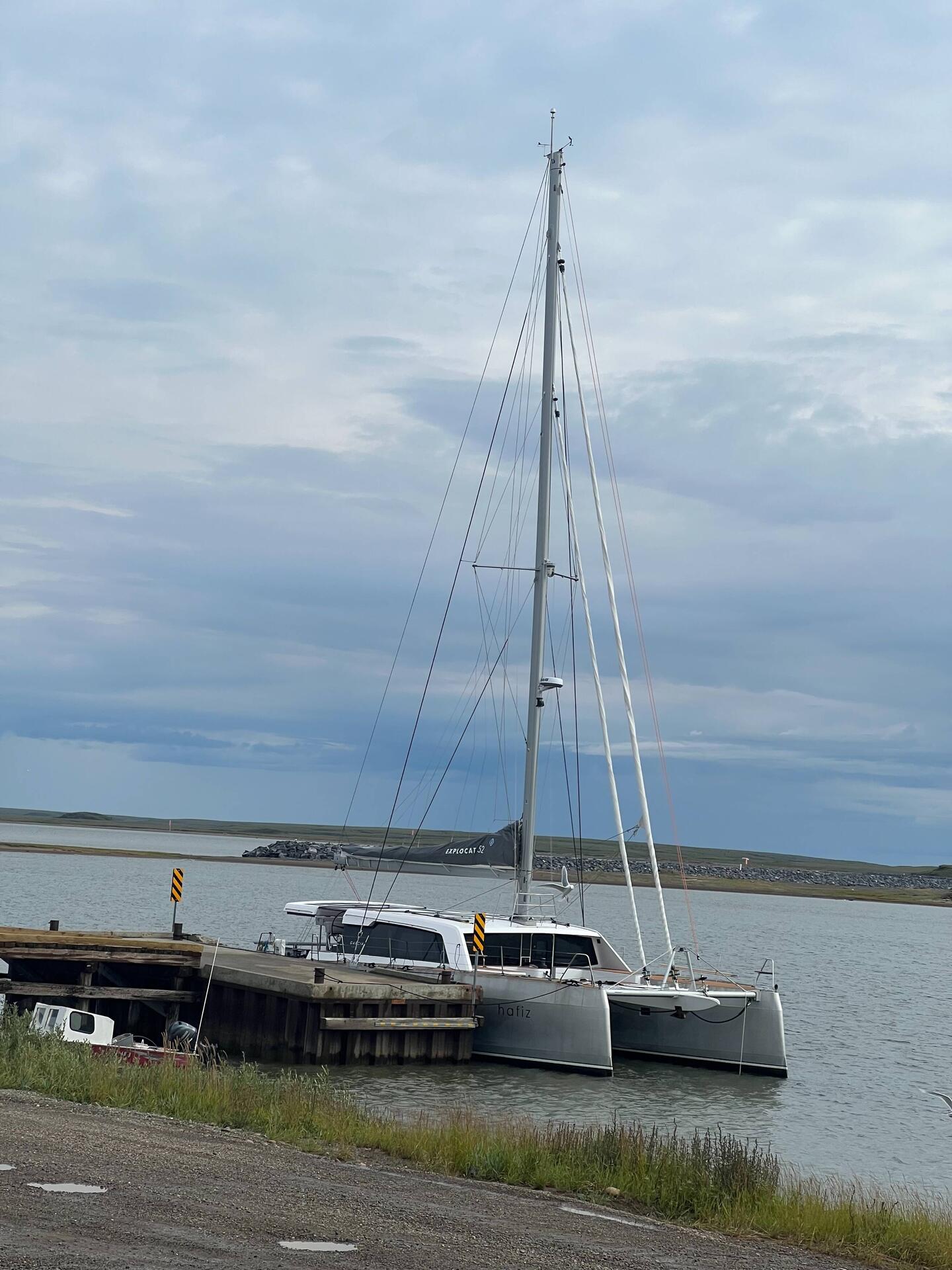 Tied up in Tuk. The storm sky is clearing up.