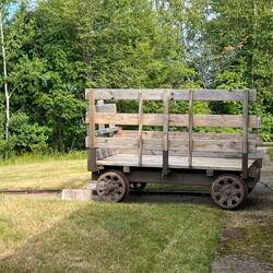 Trolly car at top of stairs, next to Foghorn building.