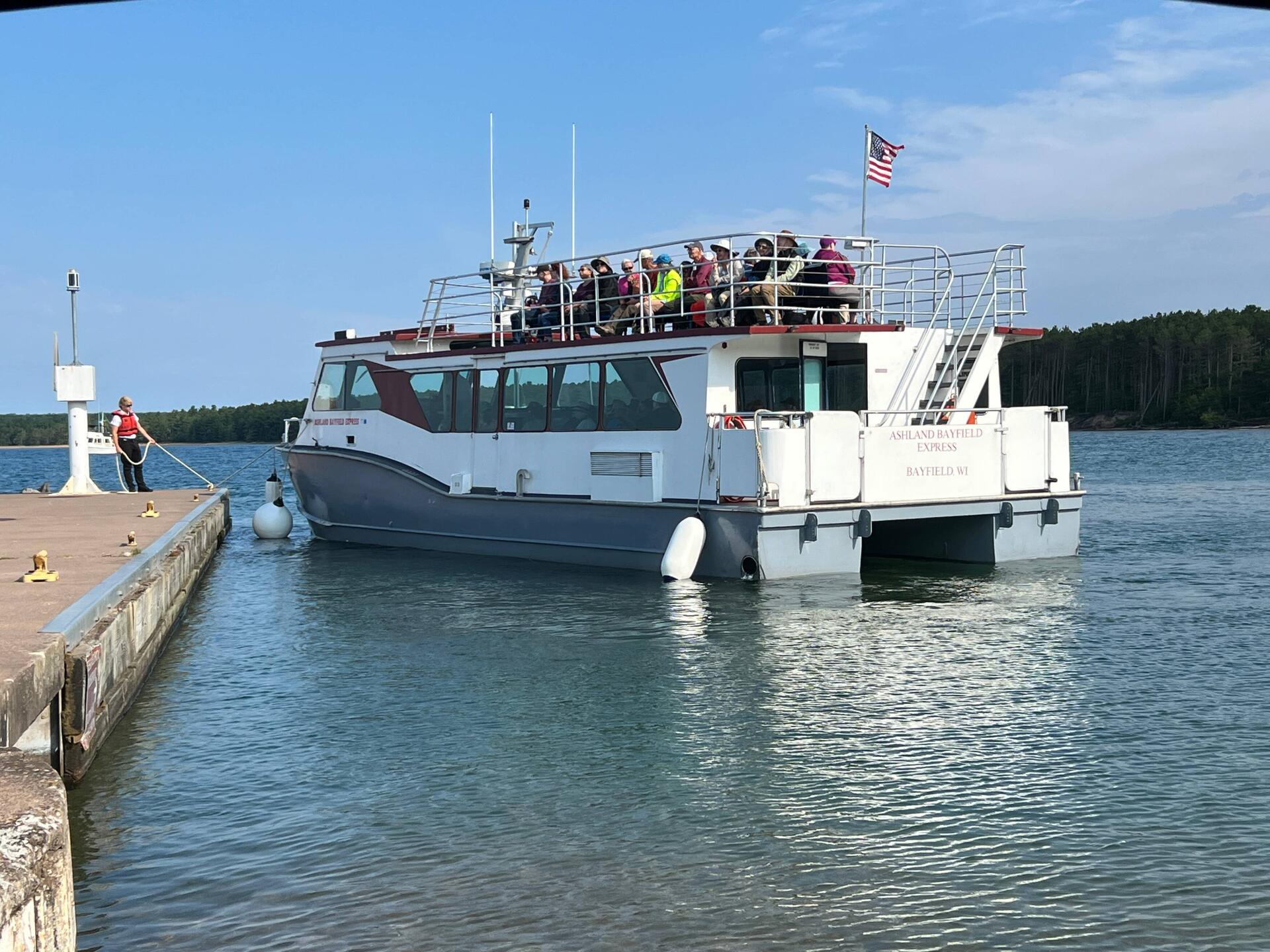 Ashland - Bayfield Passenger Ferry arriving to drop off passengers.