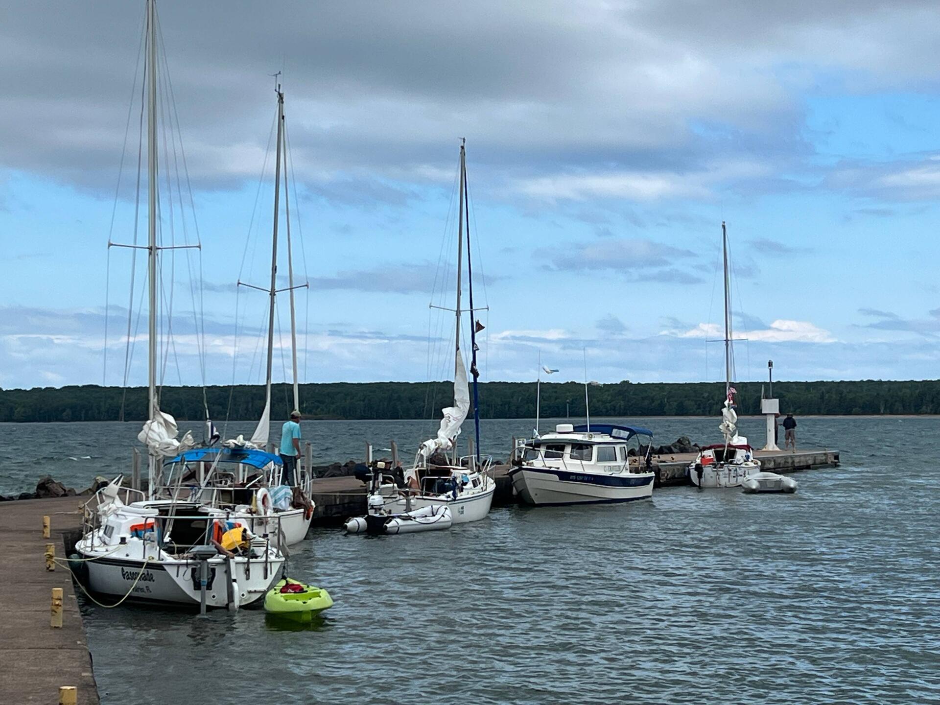 C-Traveler surrounded by sail boats.