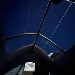 The view from our glass-roof cabin at night 😍