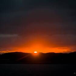 Sunset as m/s Havila Castor begins its approach to Rørvik.