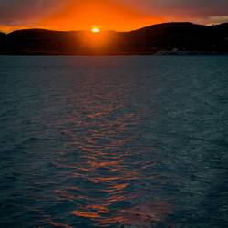 Sunset as m/s Havila Castor begins its approach to Rørvik.