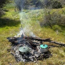 Campfire with damper and mulled ginger beer