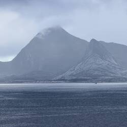 The peak of Hestmannen has hidden in the clouds.