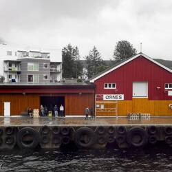Port-to-port passengers waiting to embark the ship in Ørnes.