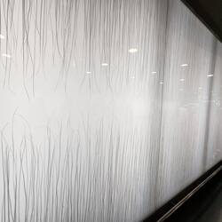 Tens of thousands of handpainted straws. Message: without rest & weight we would blow away