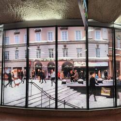 It is cylindrical! Very amazing artwork!!