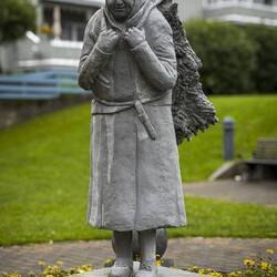 Anna Benoni "glided along the street ... humming in blissful calm ..." carrying a bundle of juniper.