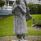 Anna Benoni "glided along the street ... humming in blissful calm ..." carrying a bundle of juniper.
