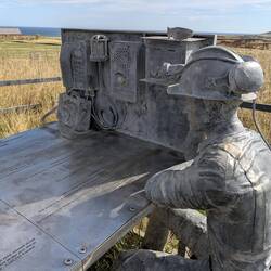 A sculpture and information about the local mine, which is both under land and sea