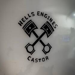 On the door of the workshop.