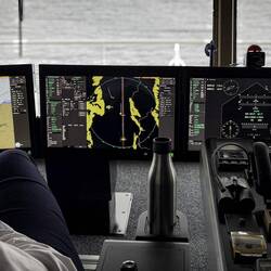 Some of the many monitors with information used to navigate the vessel.