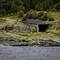 Looks like someone used natural rock formations as the walls for a shed.