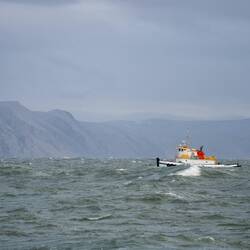 Small tug, big waves, and...