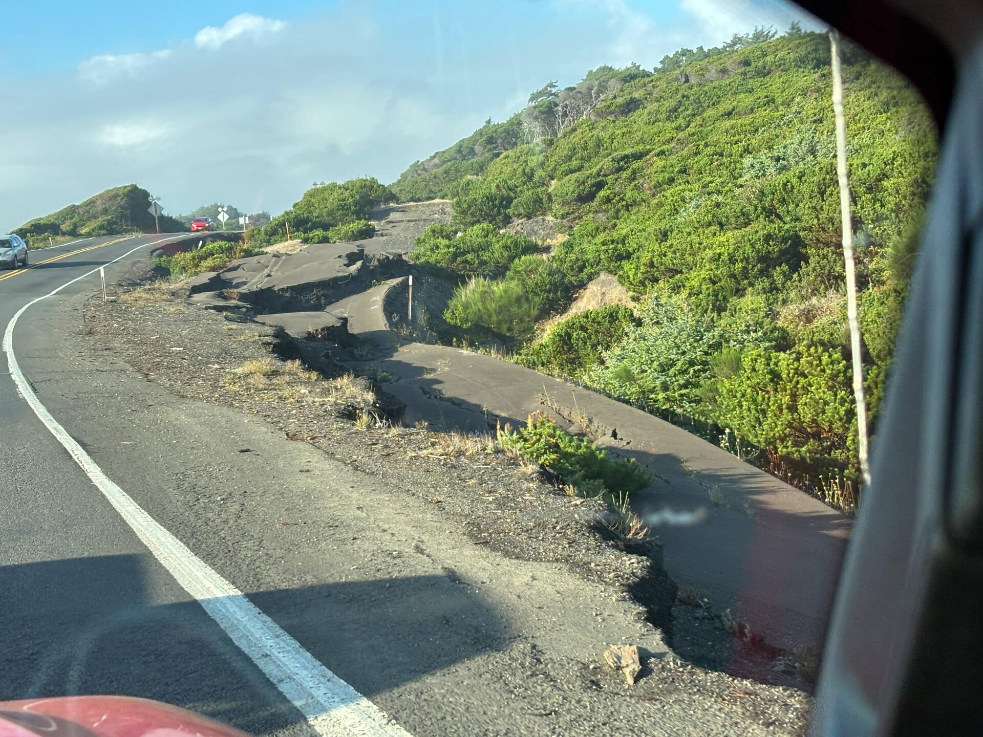 The road has been rerouted around one of many road slips
