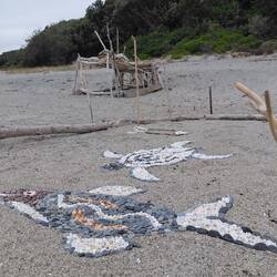 Some very talented beach art at the far end of the beach