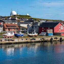 The red building on the right has the "Make the North Great Again" art installation.