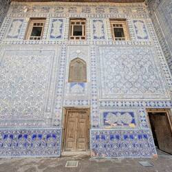 Stone Palace - original decoration with lowest levels degrading because of moisture from below