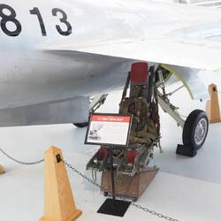 The F-104 ejection seat exits the bottom of the plane