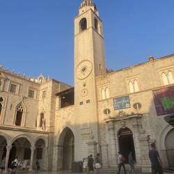 Main square of Dubrovnik. Middle of clock tower has time too