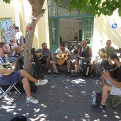 Musicians playing in the street outside the museum