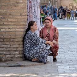 Two ladies taking a break from attending their stalls