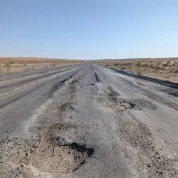 The idea is to drive as fast as possible to just fly over the potholes