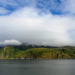 Sunshine! ... mountains and clouds en route to Øksfjord.