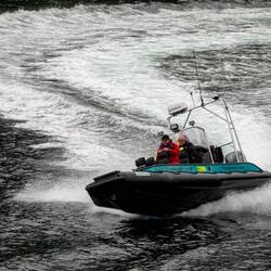 Rib boat driver showing off as it passes m/s Havila Castor.