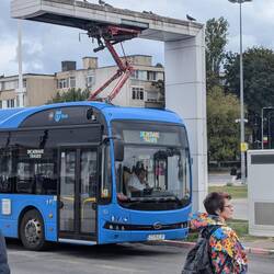 Battery powered bus at a charging station