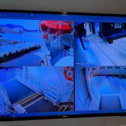 A closer look at the monitor showing the various camera angles during the gangway deployment.