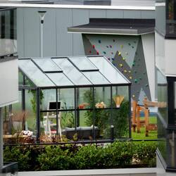 A peek through the buildings at the communal garden for the residents.