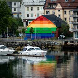 A rainbow pride flag is painted on the Gammelbrygga (old wharf).