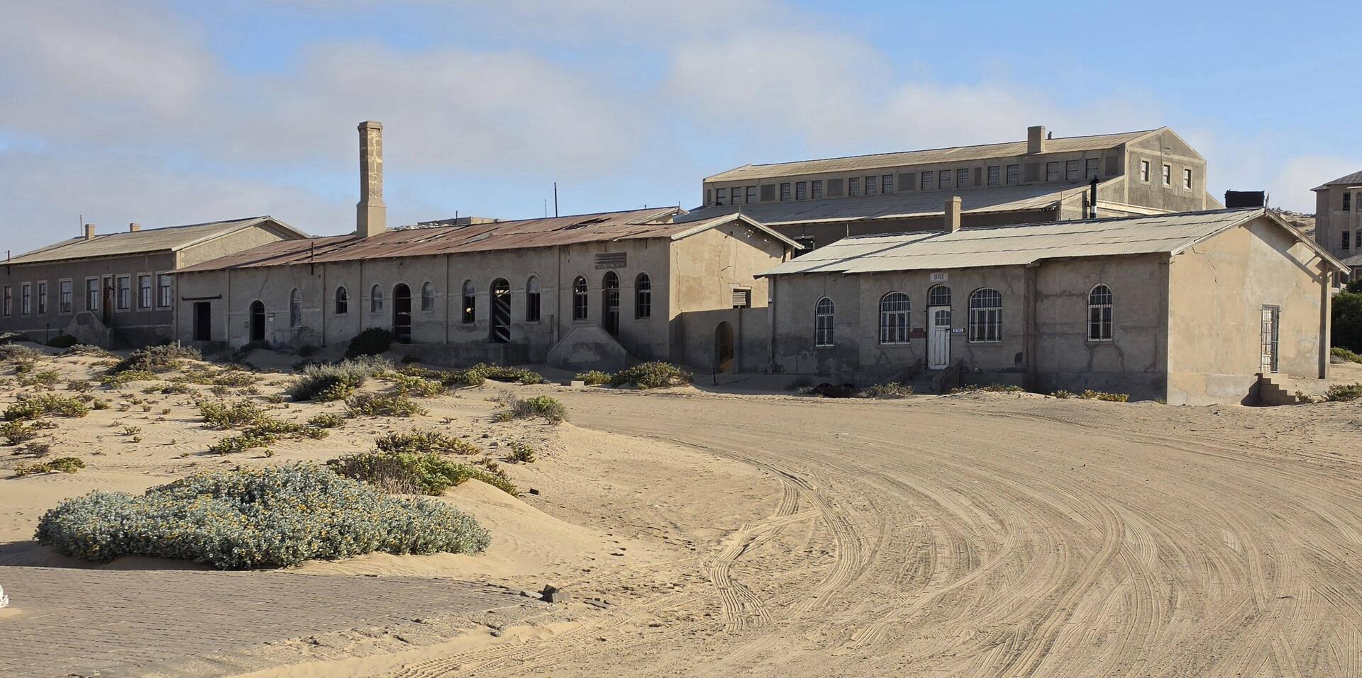 Derelict buildings greet you