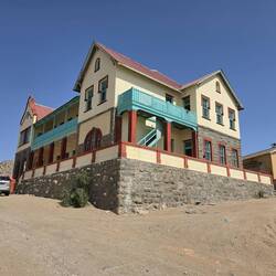 The houses are colourful and look great against that deep blue sky